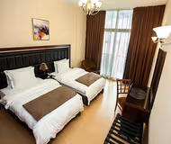 Luxury bedroom at 12 Mankhool Street Serviced Apartments, Bur Dubai