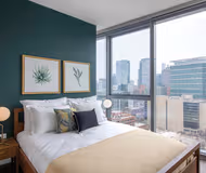 Luxury bedroom at W. Madison #2006 Serviced Apartment, West Loop