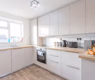 Fully equipped kitchen at Wren Suite Apartment