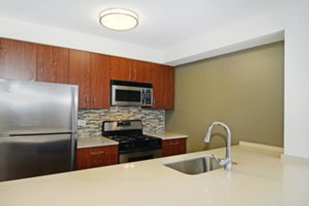 Fully equipped kitchen at 21 Chelsea Furnished Apartments, Chelsea