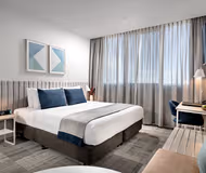 Simplistic living area in Quest Midland