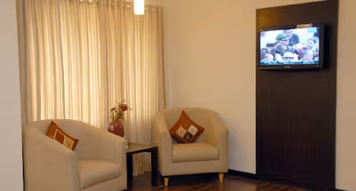 Simplistic living area in Electronic City Serviced Apartments in Bengaluru