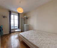 Luxury bedroom at RUE AUGEREAU SERVICED APARTMENT PALAIS BOURBON