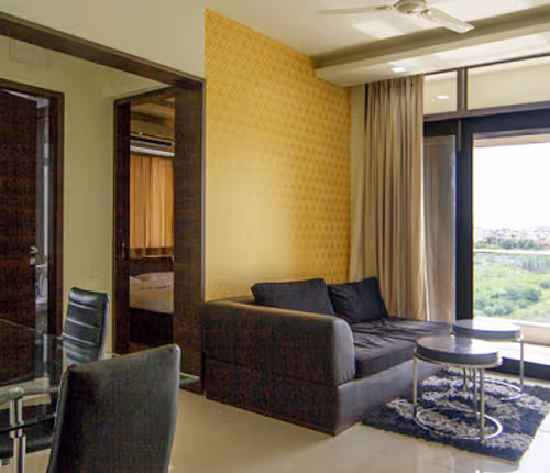 Simplistic living area in Ashoka Nagar Apartments