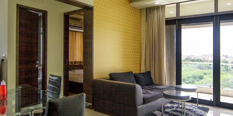 Simplistic living area in Ashoka Nagar Apartments