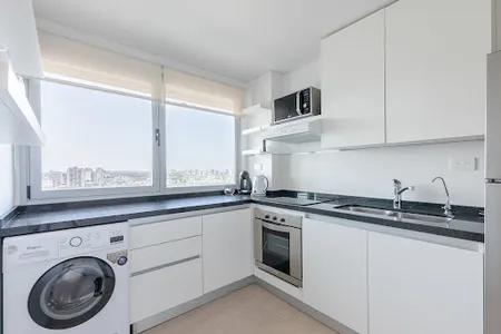 Fully equipped kitchen in 2 bed at Astor Tower