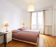 Luxury bedroom at RUE RAFFET SERVICED APARTMENT