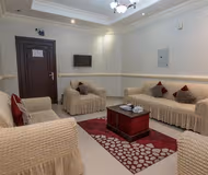 Living area at Al Khateeb Al Tabrizi Street Serviced Apartment
