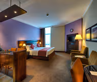 Open plan bedroom at Al Muraqqabat Street Serviced Apartments