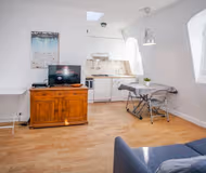 A HAUSSMANNIAN BUILDING- A MARAIS ABODE