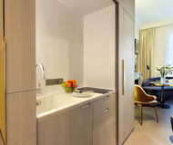 Fully equipped kitchen at La Clef Serviced Apartment, Champs Elysees