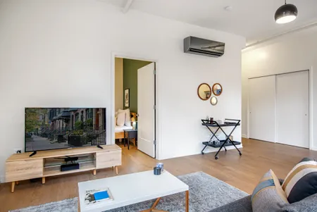 Bright living area at W. Chicago Avenue #216 Serviced Apartment, River North