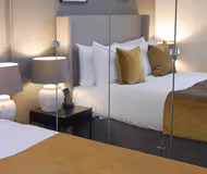 Bedroom at Nevern Place by Supercity Aparthotels