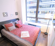 Master bedroom at Wall Street 2 Bed Furnished Apartment, Financial district