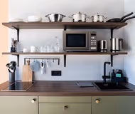 Fully equipped kitchen at Black F Tower