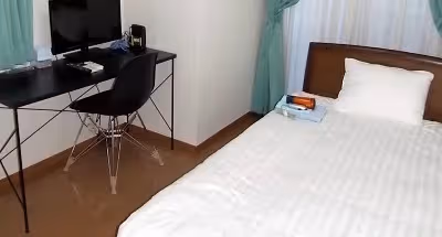 Simplistic living area in 4-7 Roppongi Apartments