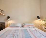 Double bed bedroom at Sants-Eixample 3 bedroom serviced apartment