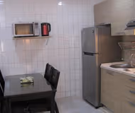 Basic kitchenette at Bin Misbah Street Serviced Apartment