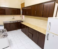 Equipped Kitchen at Prince Mohammed Bin Abdulaziz Street Serviced Apartment