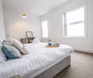 Master bedroom at Lake View Superior Apartment