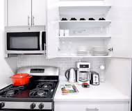 Fully equipped kitchen at Luxury West 47th street Furnished Apartment, Manhattan