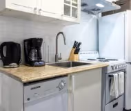 Full kitchen at Christopher Street Furnished Apartment, West Village