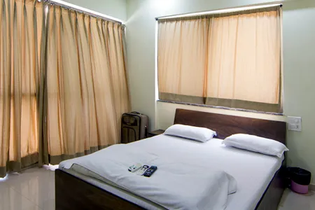 Simplistic living area in Ashoka Nagar Apartments