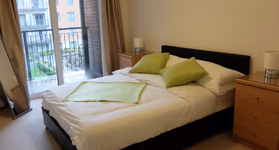 14-master-bedroom-towards-balcony-flat-60