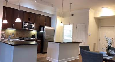 Fully equipped kitchen at Kingsboro Rd Serviced Apartment