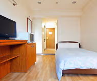 Simplistic living area in Tamagawa Apartments