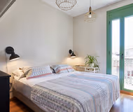 Double bed bedroom at Sants-Eixample 3 bedroom serviced apartment