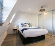 Luxury bedroom at Rathbone Pl