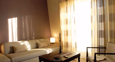 Simplistic living area in Exclusive Boulevard Hassmann -Champs Elysees