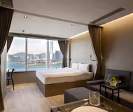 Simplistic living area in Connaught Road Apartments