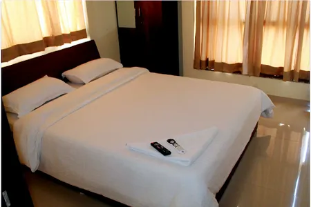 Simplistic living area in Ashoka Nagar Apartments