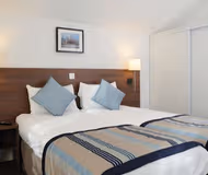 Luxury bedroom at Roissy Village Serviced Apartment, Champs Elysees