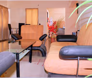 Simplistic living area in Emerald City Apartments