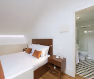 Bedroom at Firehouse - 2 People Mezzanine (with parking included)