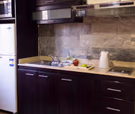 Bedroom at AUC Serviced Apartment