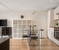 Dining space at Hoxton Apartments by Mysquare