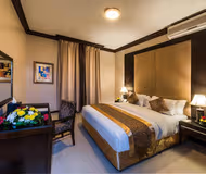 Luxury bedroom at Al Ihssa Street Serviced Apartment