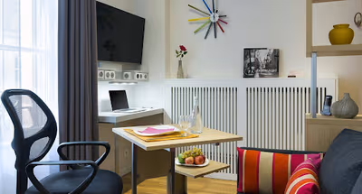 Cosy living area in Saint-Germain-des-Pres Serviced Apartment, Saint Germain