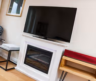 Bright living room at Central Durham Riverfront Apartment