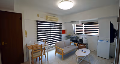 Simplistic living area in Minatoku Serviced Apartment
