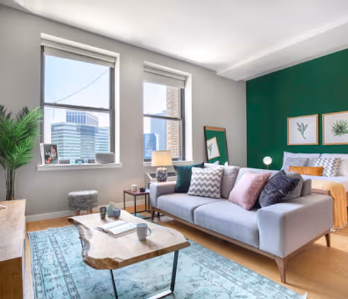 Living area at West Street Furnished Apartment, Financial district