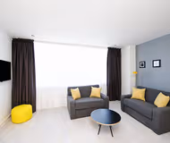 Comfy living area at Manchester Piccadilly Aparthotel