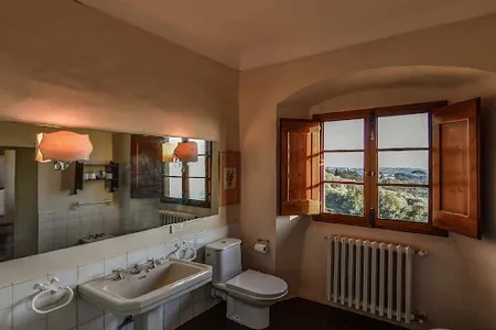 AN EXCEPTIONAL 15TH CENT RENAISSANCE TUSCAN VILLA ON THE FIRST HILLS OF FLORENCE