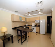 Fully equipped kitchen at Mall of Emirates St. Hotel Serviced Apartments, Al Barsha