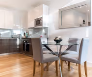 Dining space at Heathrow Lodges by MySquare