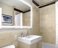 Bathroom at West Street Furnished Apartment, Financial district
